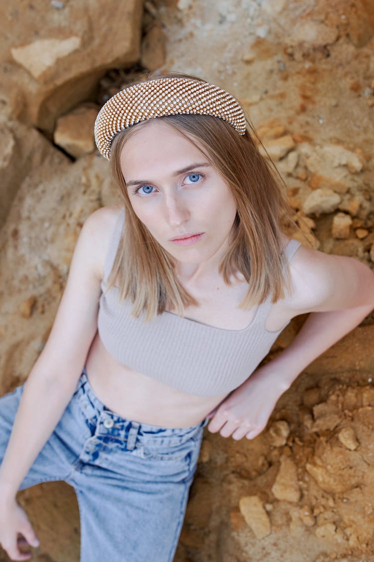 Stylish Woman In Headband Leaning On Dry Mount