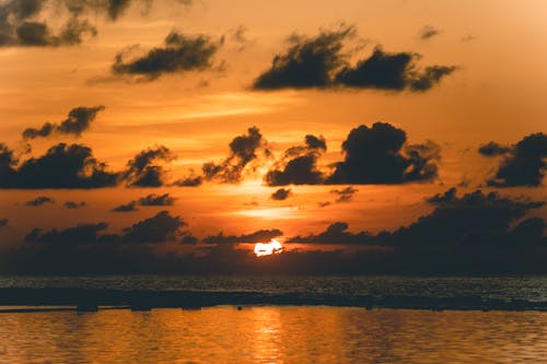 Amazing bright sunset sky over endless sea