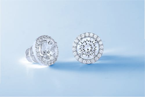 Free Silver Diamond Stud Earrings on White Background Stock Photo