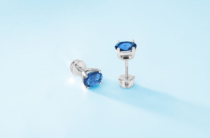 Premium blue gemstone earrings displayed at Balaji Gems and Diamonds Basavanagudi Bangalore
