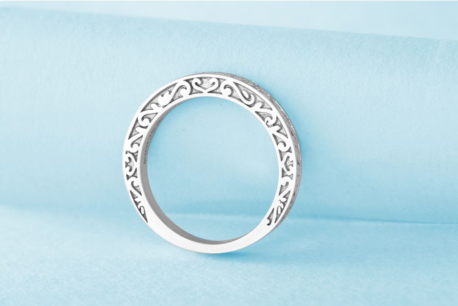 Delicate filigree and milgrain detailing on antique style wedding ring set Delicate filigree and milgrain detailing on antique style wedding ring set