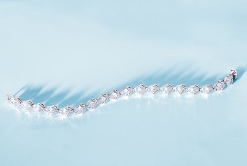 Silver Bracelet with Diamond in Close Up Photography