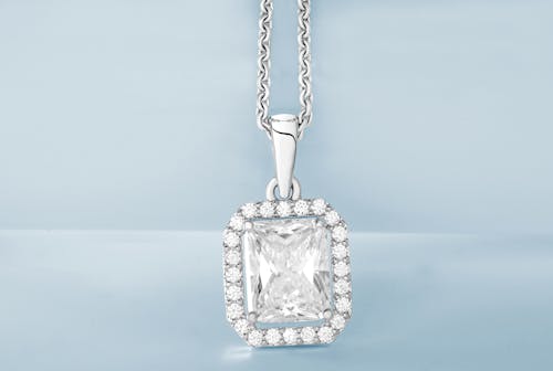 Free Silver Pendant with Diamonds in Close Up Photography Stock Photo