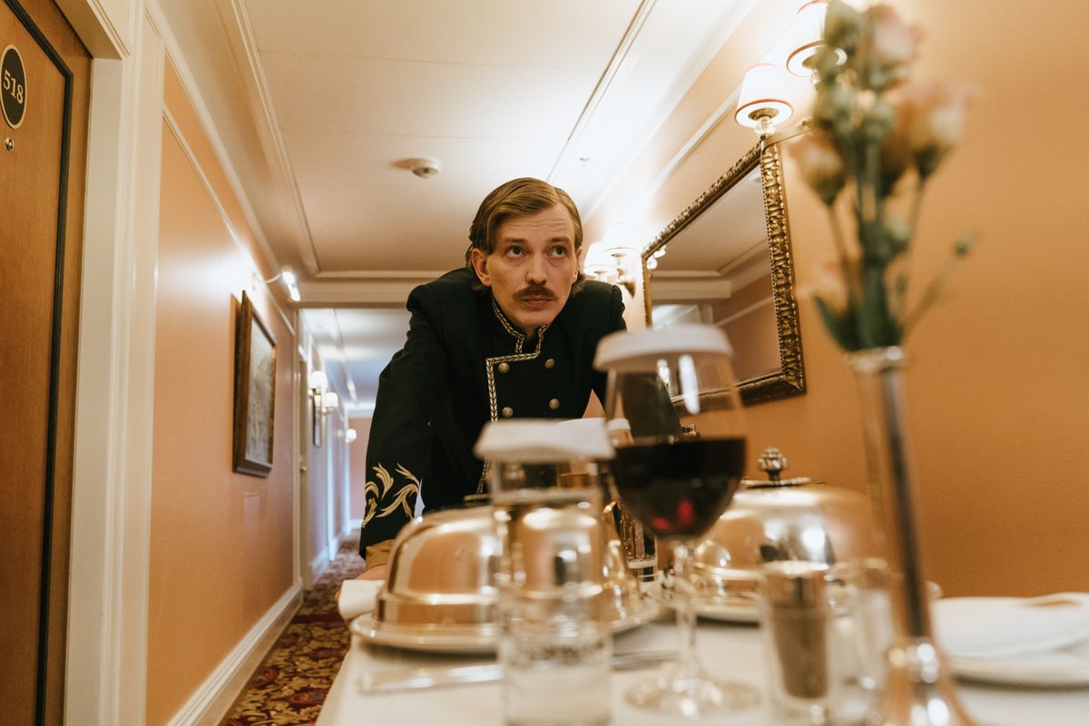 Hotel staff delivering room service