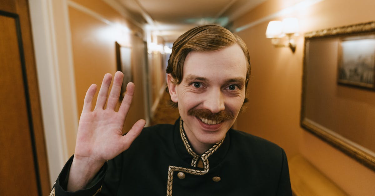 Housekeeping Staff Greeting Guests In A Hotel Setting