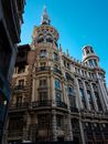 Brown Concrete Building Under Blue Sky