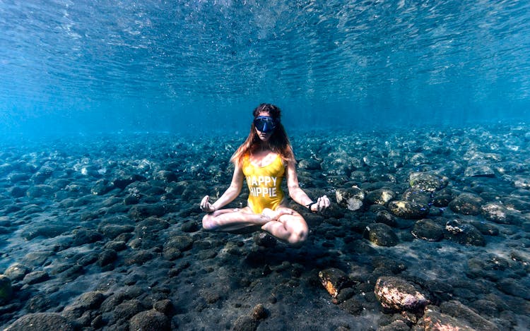 A Woman Meditating Underwater