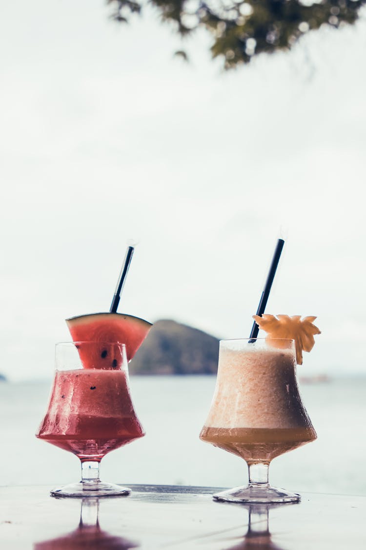 Slushes Garnished With Fresh Watermelon And Pineapple Slices