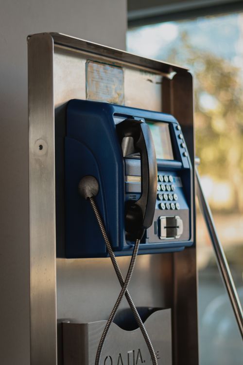 Free A close-up of a vintage public telephone booth outdoors, evoking nostalgia. Stock Photo