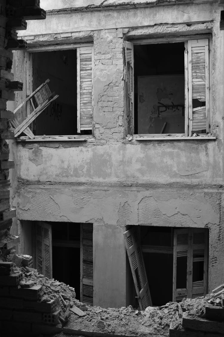 Black And White Photo Of Destroyed Apartment Buildings 