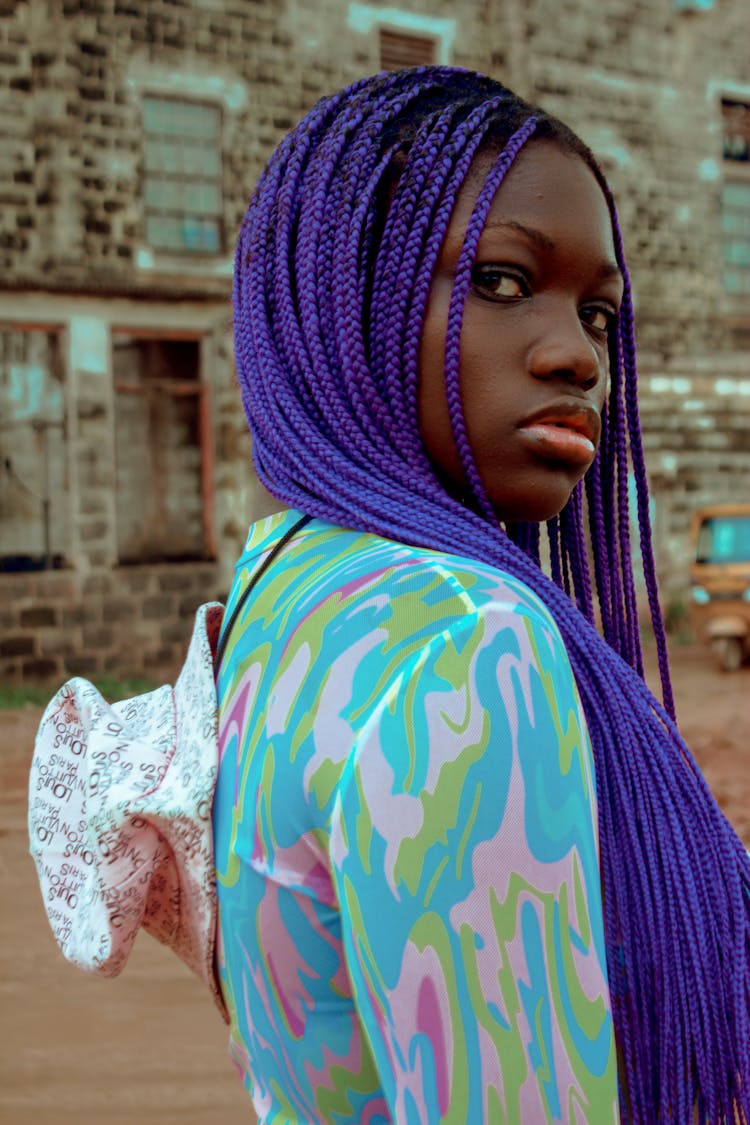 A Woman With Braided Purple Colored Hair