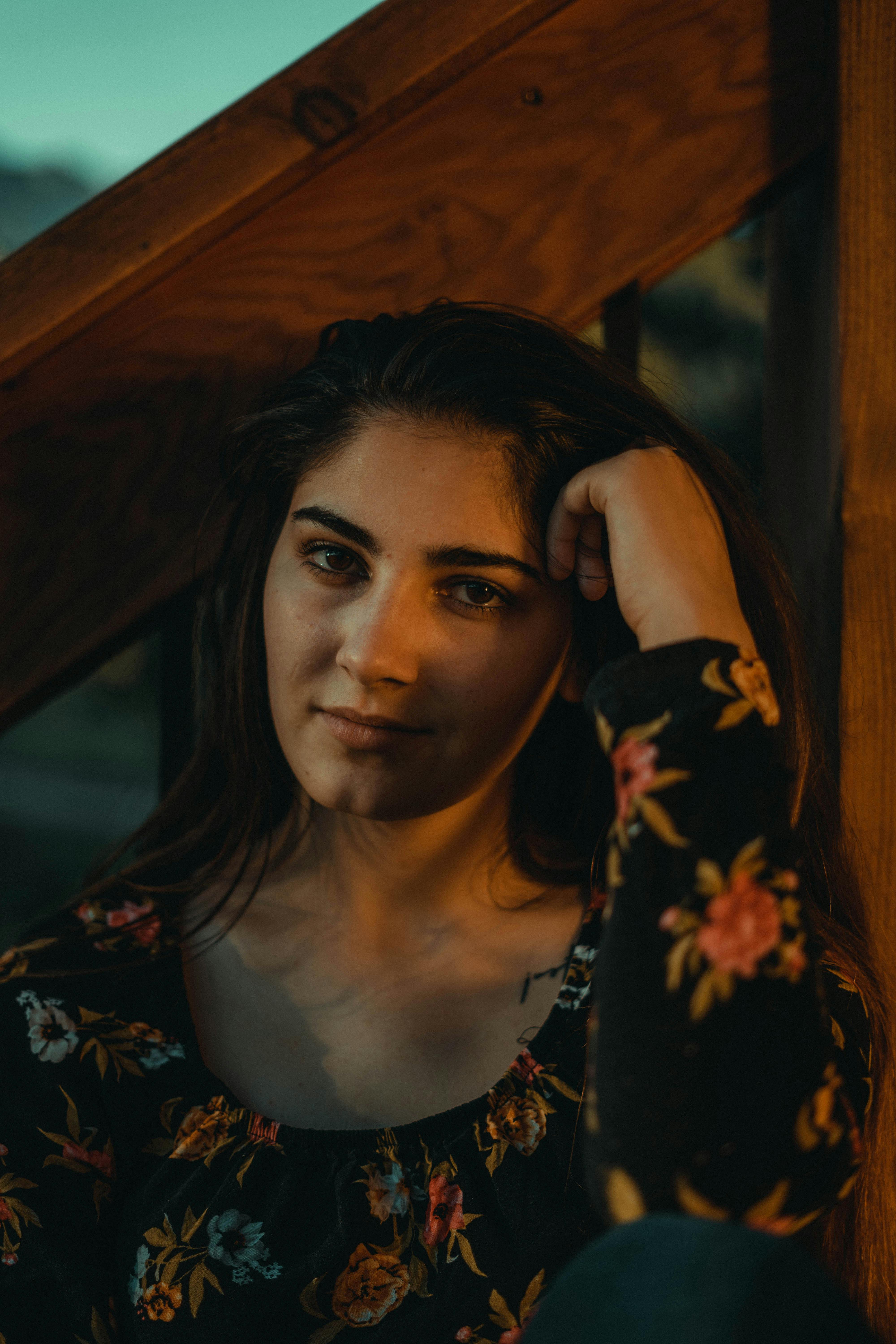 Woman in Brown Floral Long Sleeve Dress · Free Stock Photo