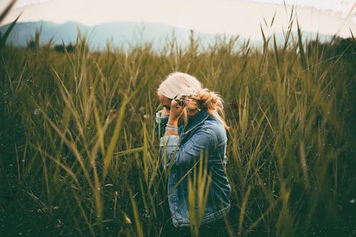 Woman Standing on Grass