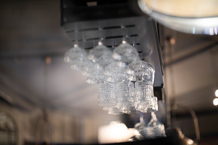 Hanging Wine Glasses In A Bar