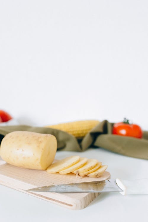 Sliced Cheese on White Ceramic Plate