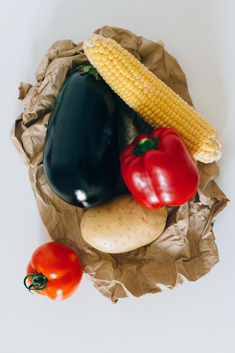 Fresh Vegetables On Brown Paper In Close-Up Photography