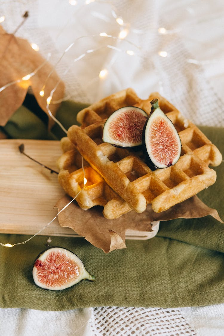 Sliced Fresh Fruit On Delicious Waffles