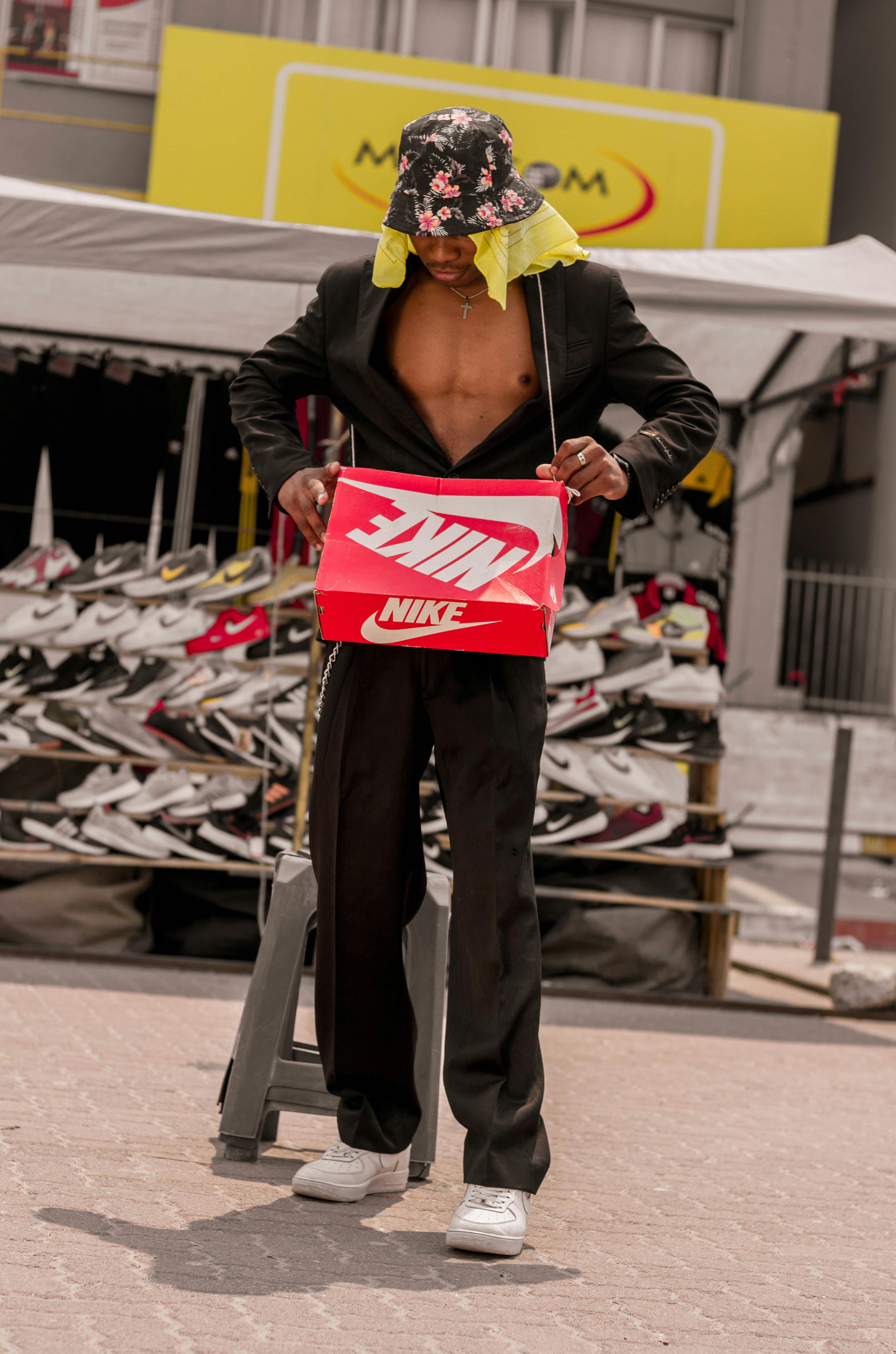 black male seller on street market