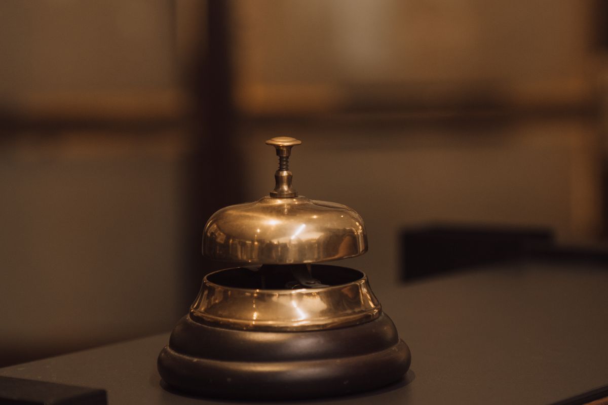 Reception bell on a hotel front desk