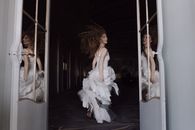 Woman in White Dress Running