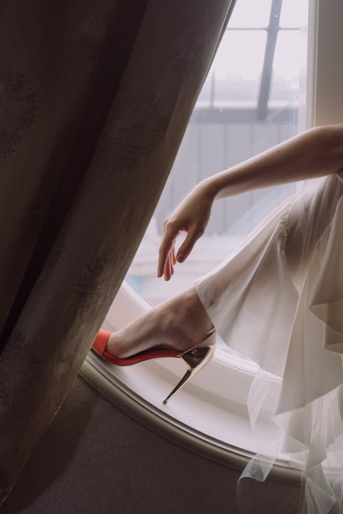 Free Person Wearing High Heels and White Dress Stock Photo