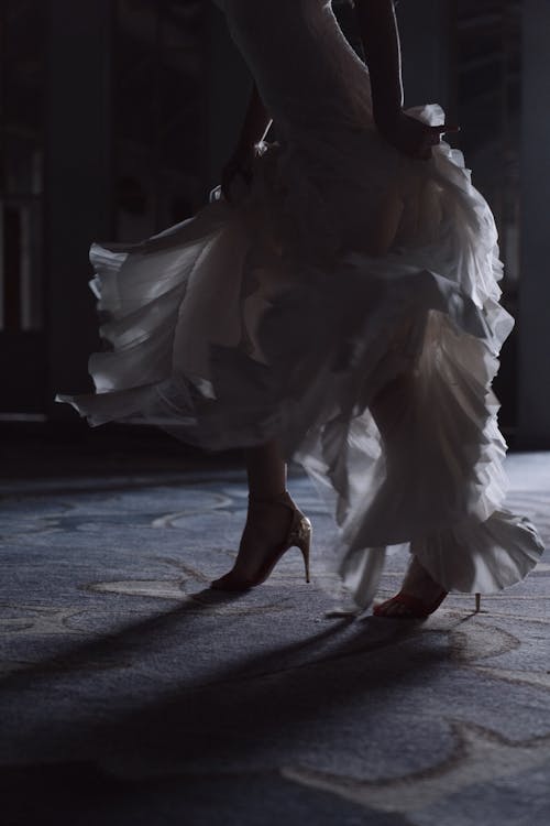 Free Person in White Dress Dancing Stock Photo