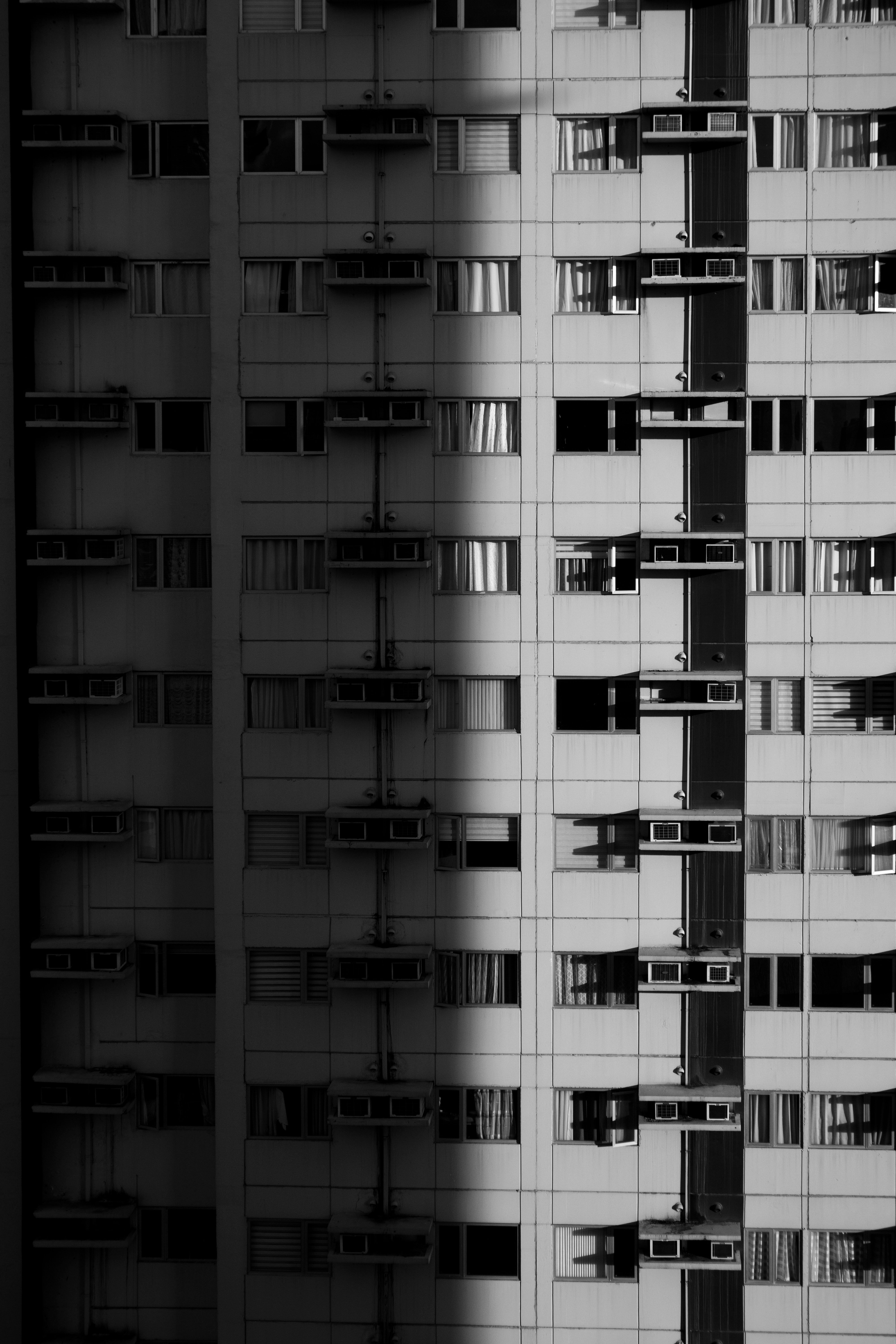 Grayscale Photo of High-Rise Building · Free Stock Photo