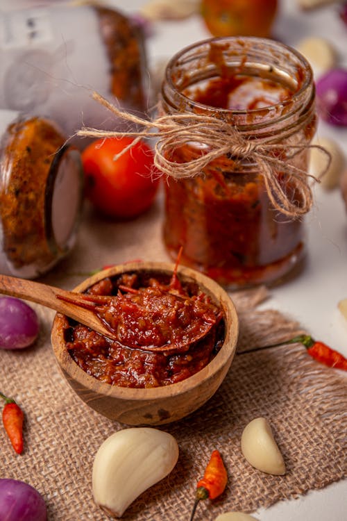 Free Red Sauce in Clear Glass Jar Stock Photo