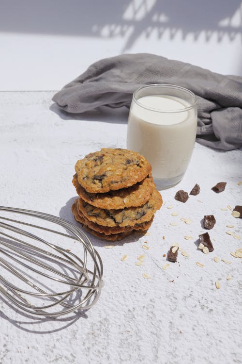 Free Cookies Beside a Glass of Milk Stock Photo