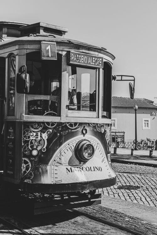 Free Classic black-and-white tram in Porto, capturing vintage charm and urban transportation. Stock Photo