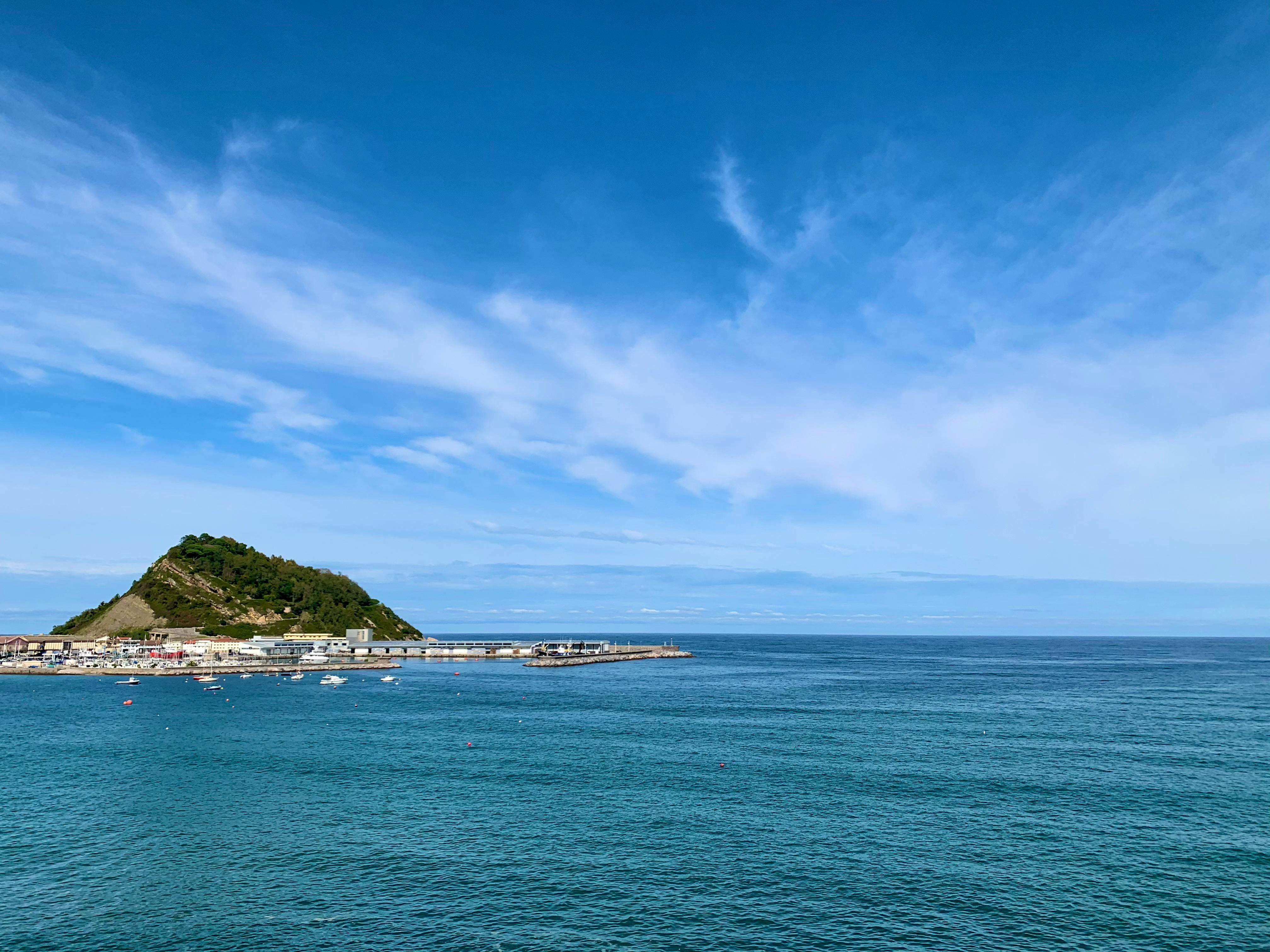 developer cloud island — Photo by Egor Kunovsky on Pexels