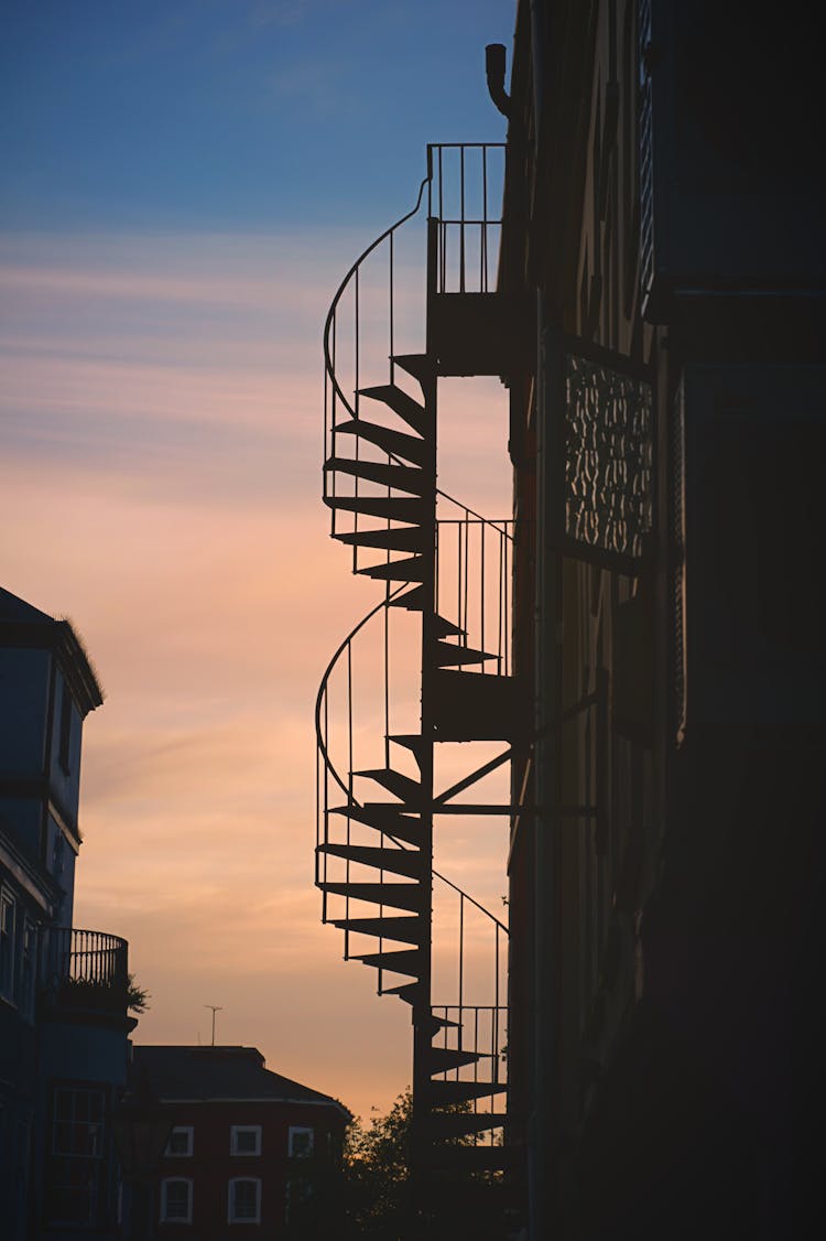 Silhouette Spiral Stairs During Sunset