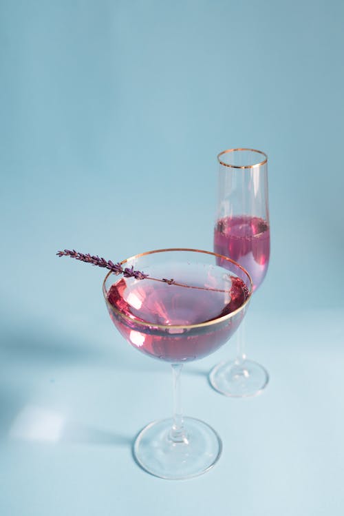 Champagne Glasses against a Light Blue Background