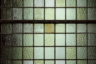 Grid of textured cathedral glass — photo by hans middendorp on Pexels
