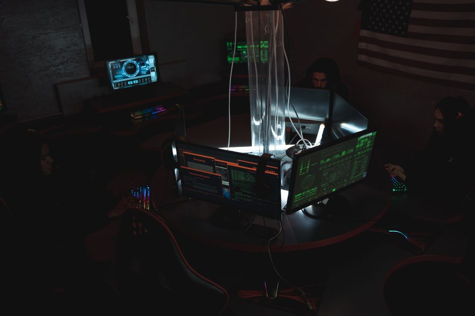 Cybersecurity team collaborating on website protection and data security