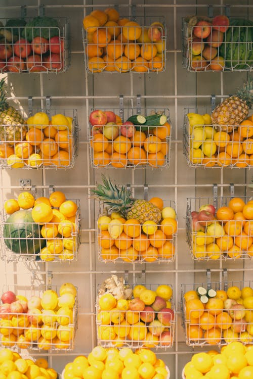 Assorted Fruits on a Shelf