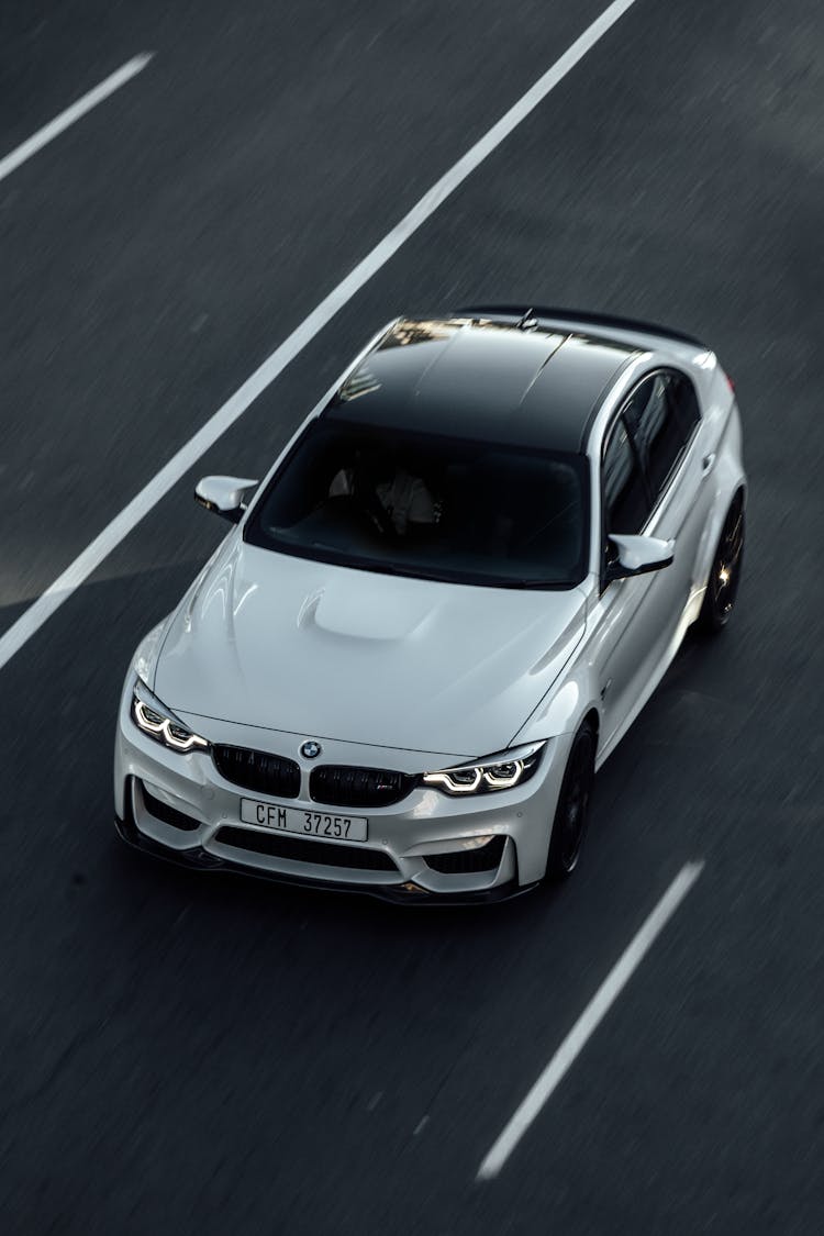 White BMW M3 Driving On The Road