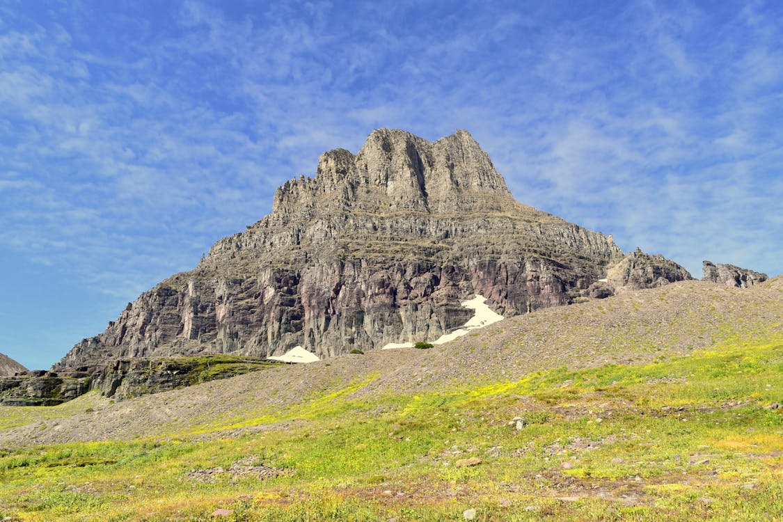 Free A Rocky Mountain Scenery under the Blue Sky Stock Photo
