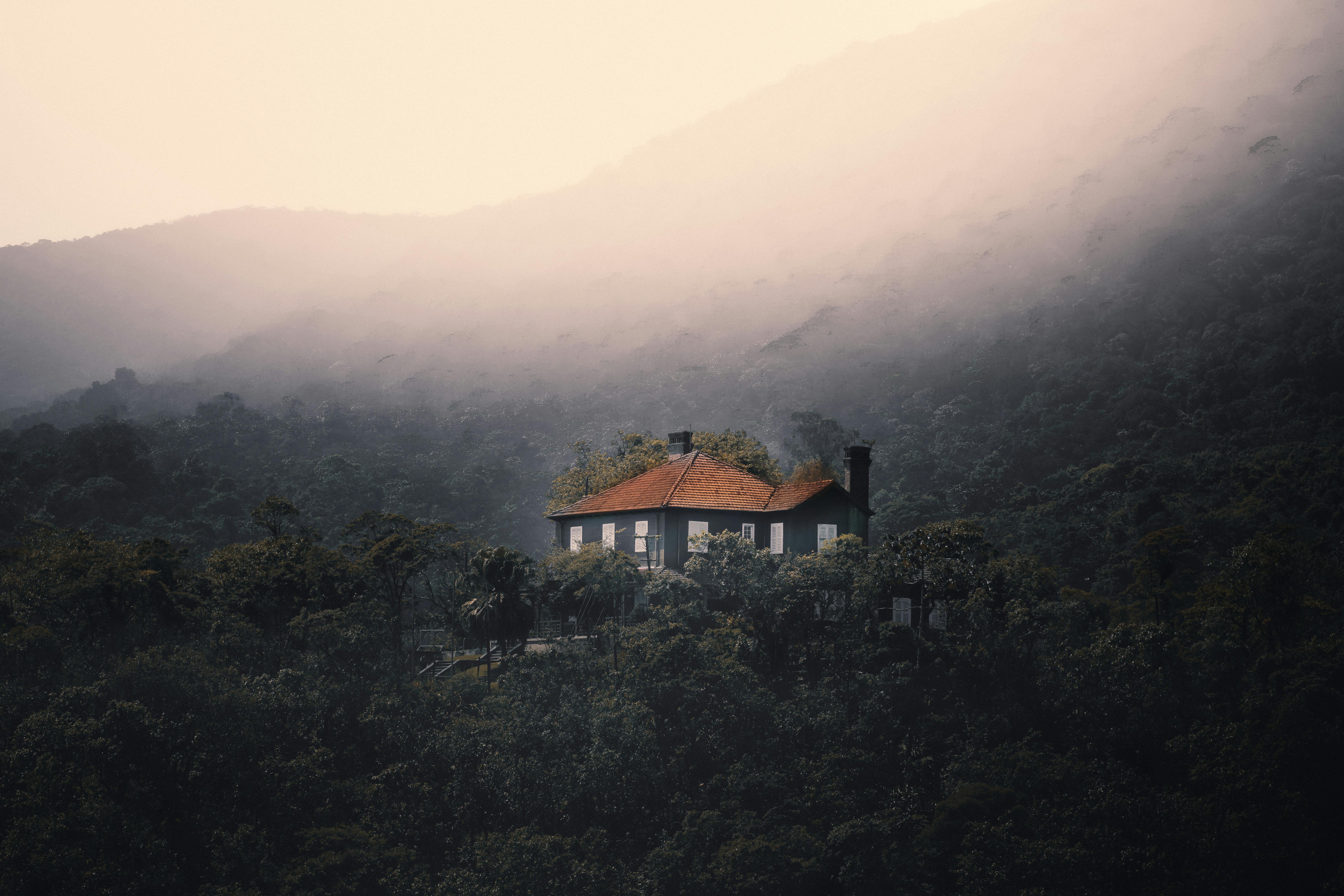 Small House On Hill In Foggy Weather · Free Stock Photo