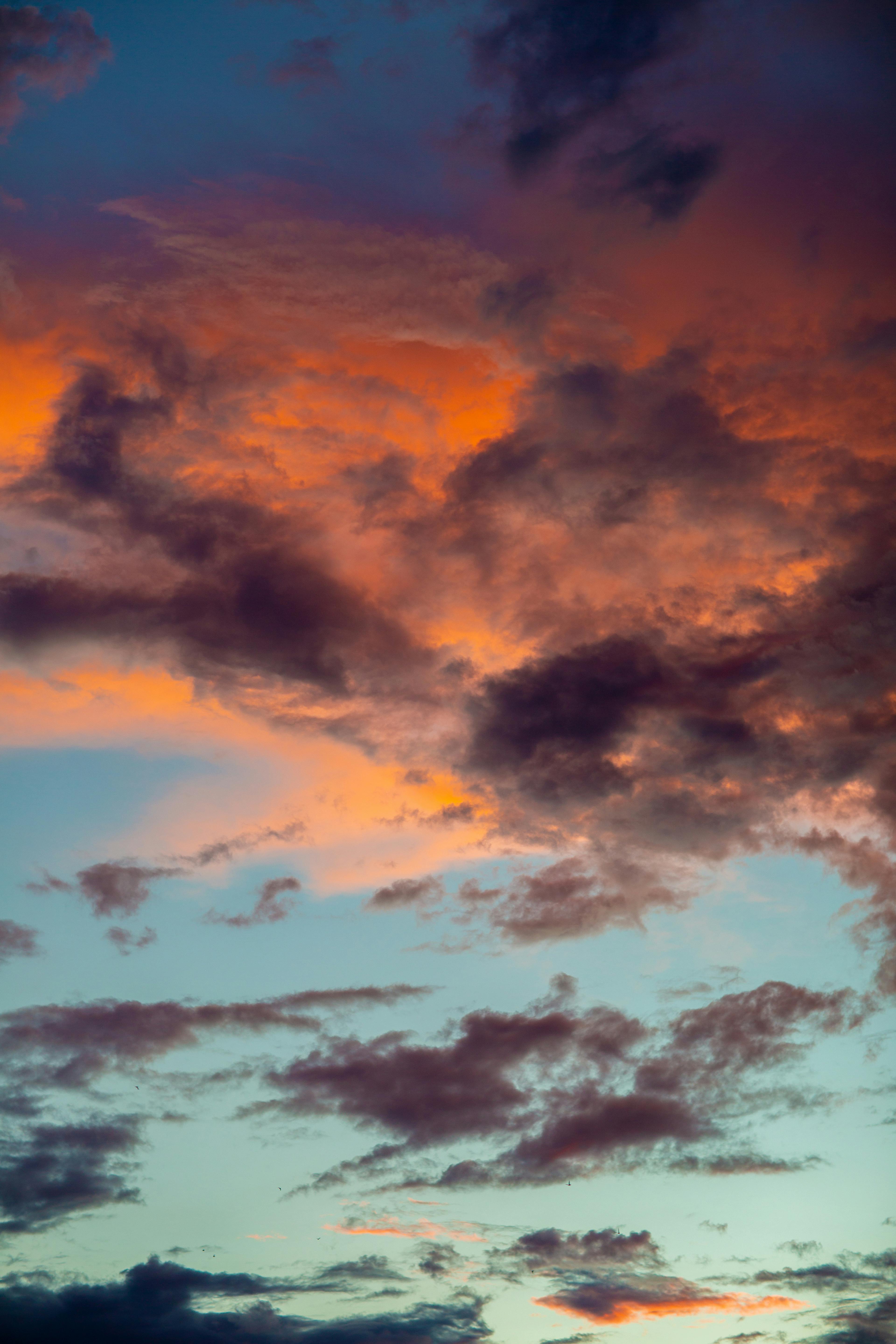 Cloudy colorful sunset in evening time · Free Stock Photo