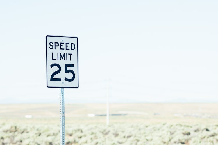 Sign On Roadside With Speed Limit