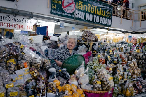An Elderly Woman Selling Her Goods