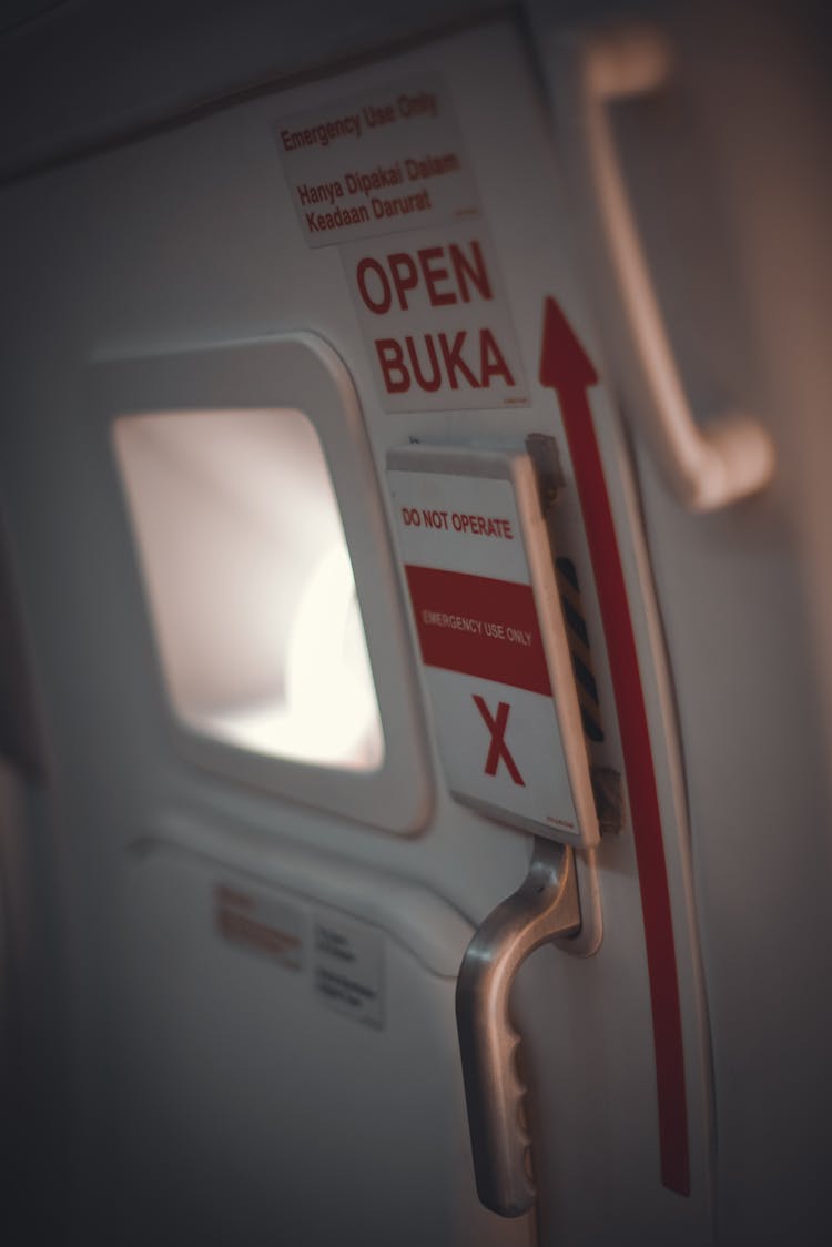 Airplane Door With Arrow And Small Illuminator