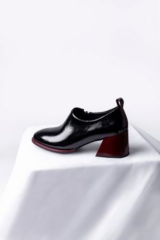 Black Leather Shoe on a White Background