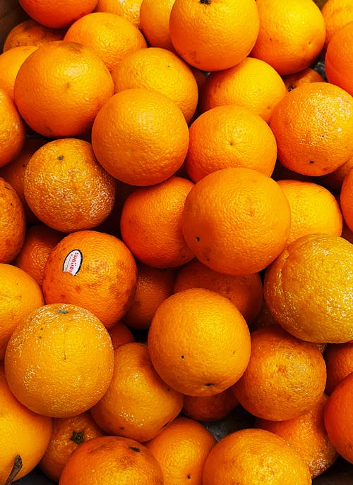 Бесплатное стоковое фото с апельсины, вертикальный выстрел, еда