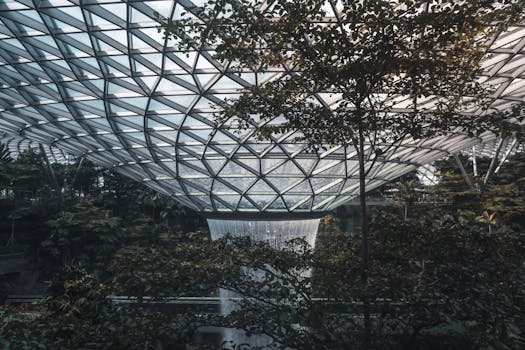 Explore the iconic Rain Vortex in Singapore's Jewel Changi Airport, an architectural and natural wonder.