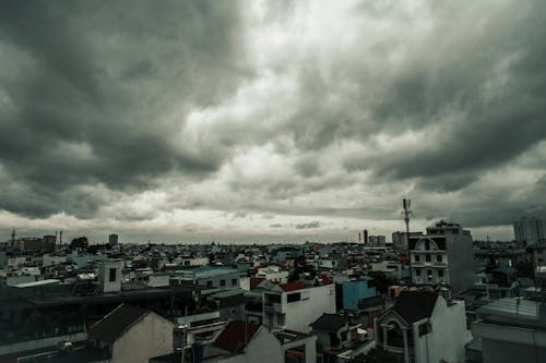 Aerial View of City Under the Cloudy Sky