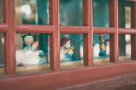 Red and White Wooden Framed Glass Window