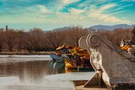 Traditional Boats on River in Autumn