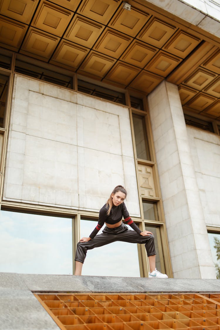 Woman Posing With Her Legs Wide Open 